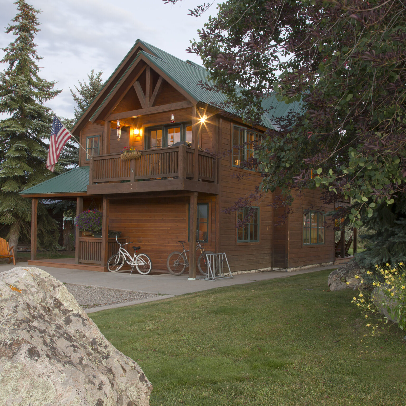 Duncan Priate home Duncan private home in Crested Butte, Colorado during the evening dusk on a summer day with it's lights on